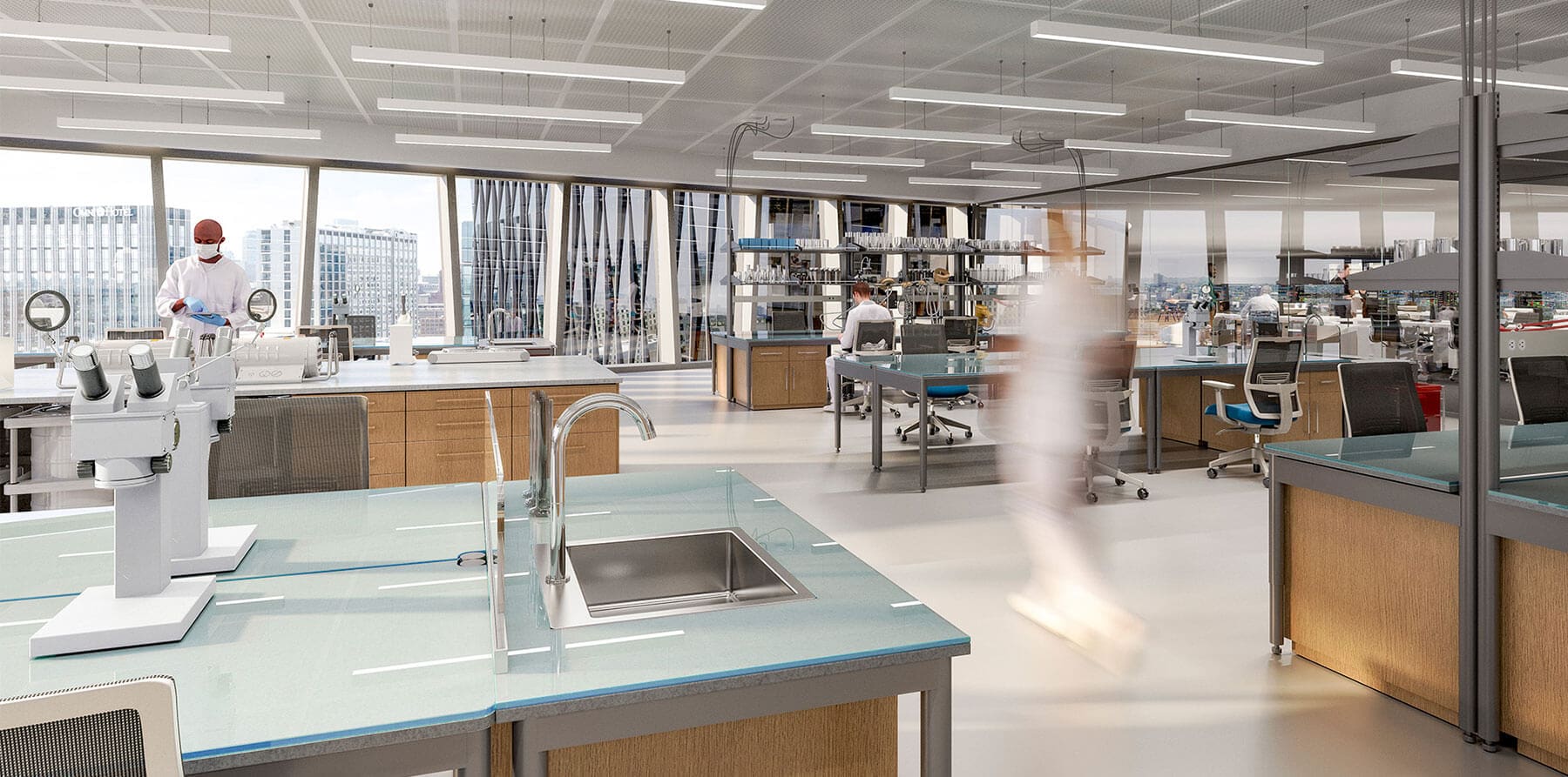 Scientists in an open concept lab and office workspace