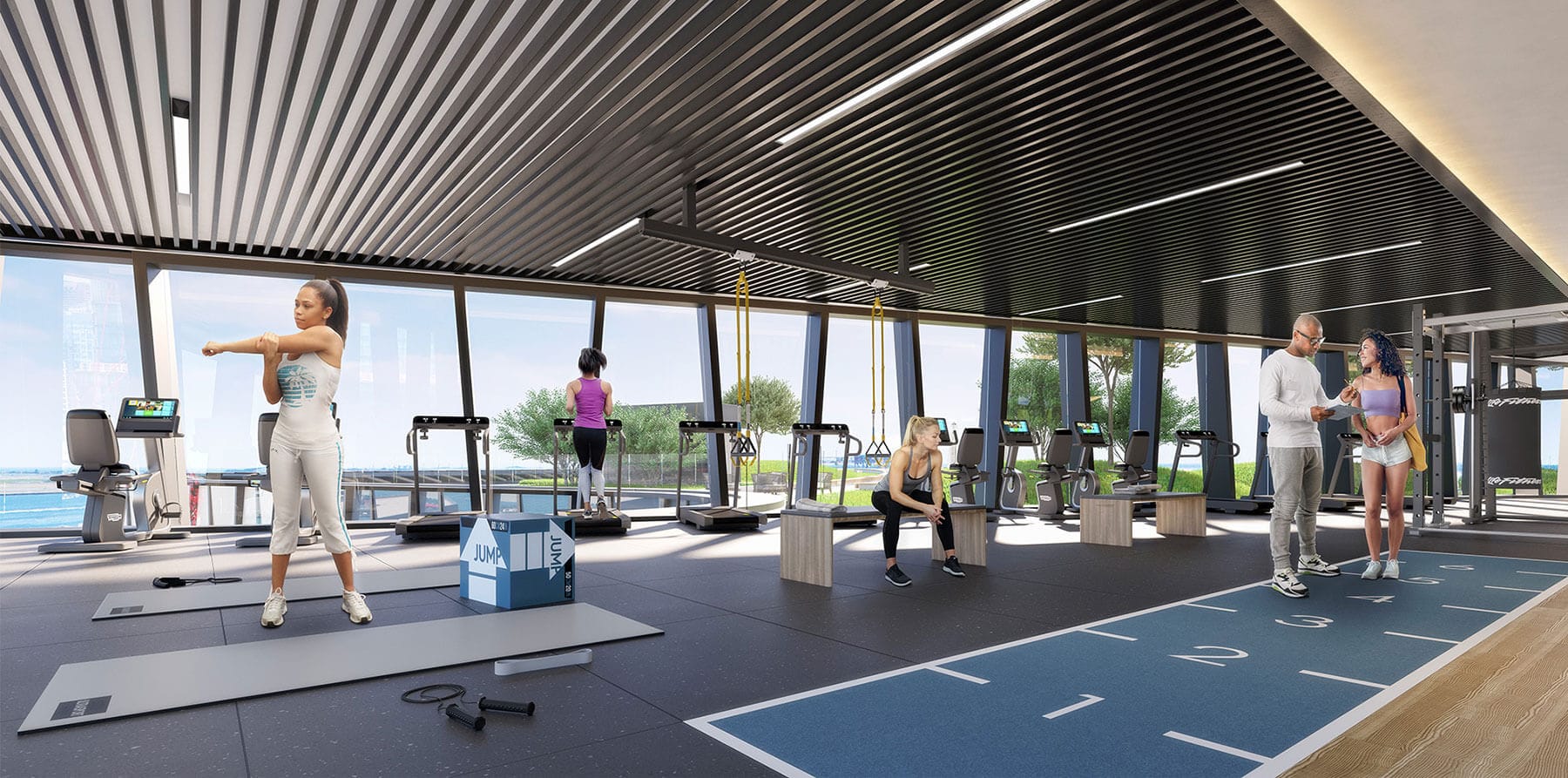 Tenants use the on-site gymnasium with Seaport views