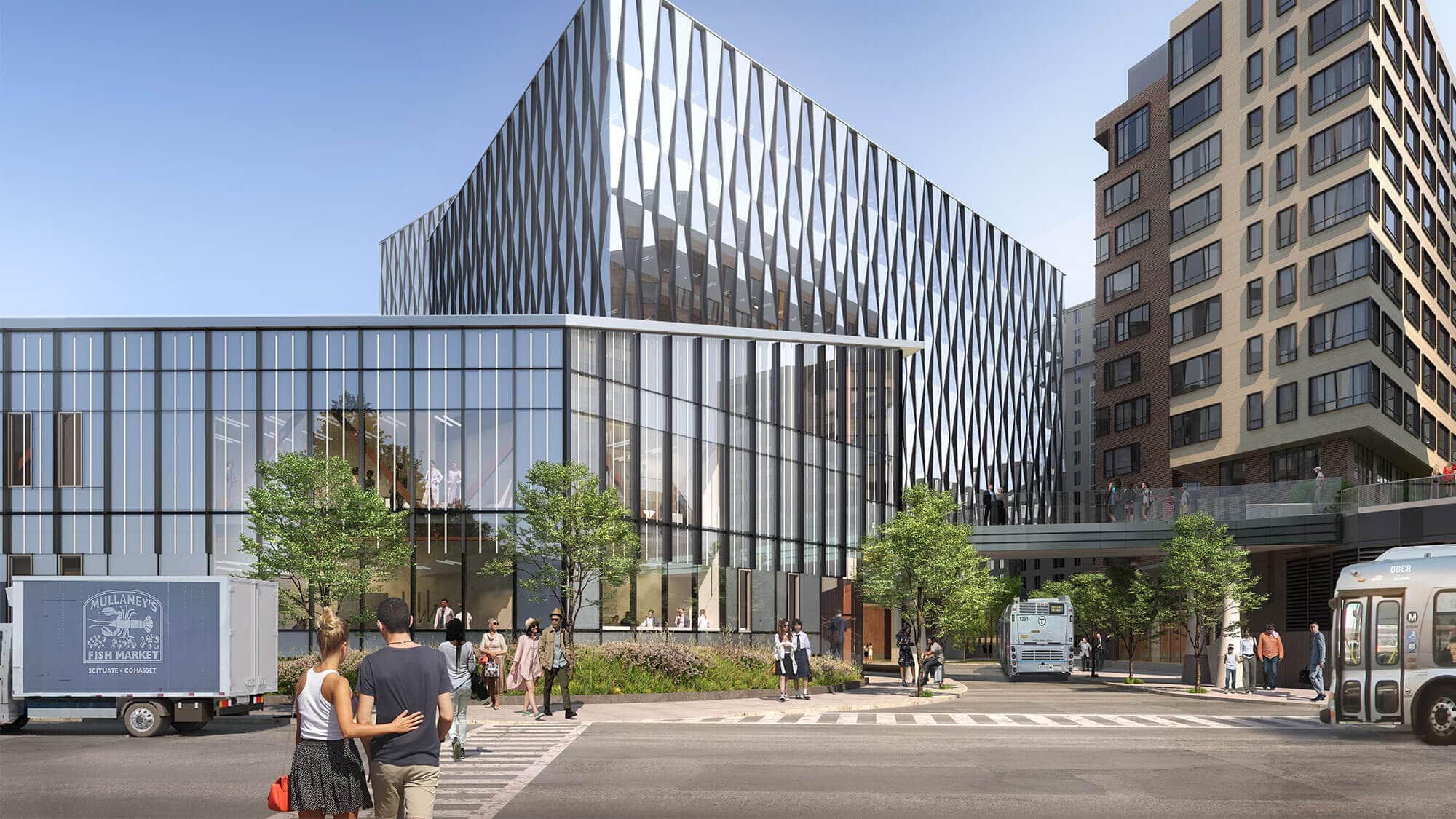 Street view of a modern, glass life science pavilion and entryway